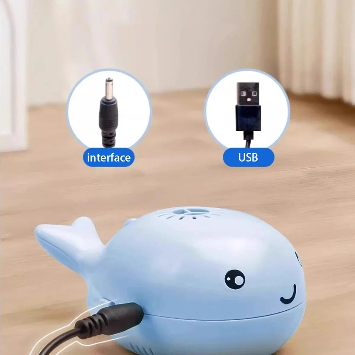 Pink whale-shaped electric floating cat toy with USB rechargeable fan, portable design, suitable for pet play and entertainment.