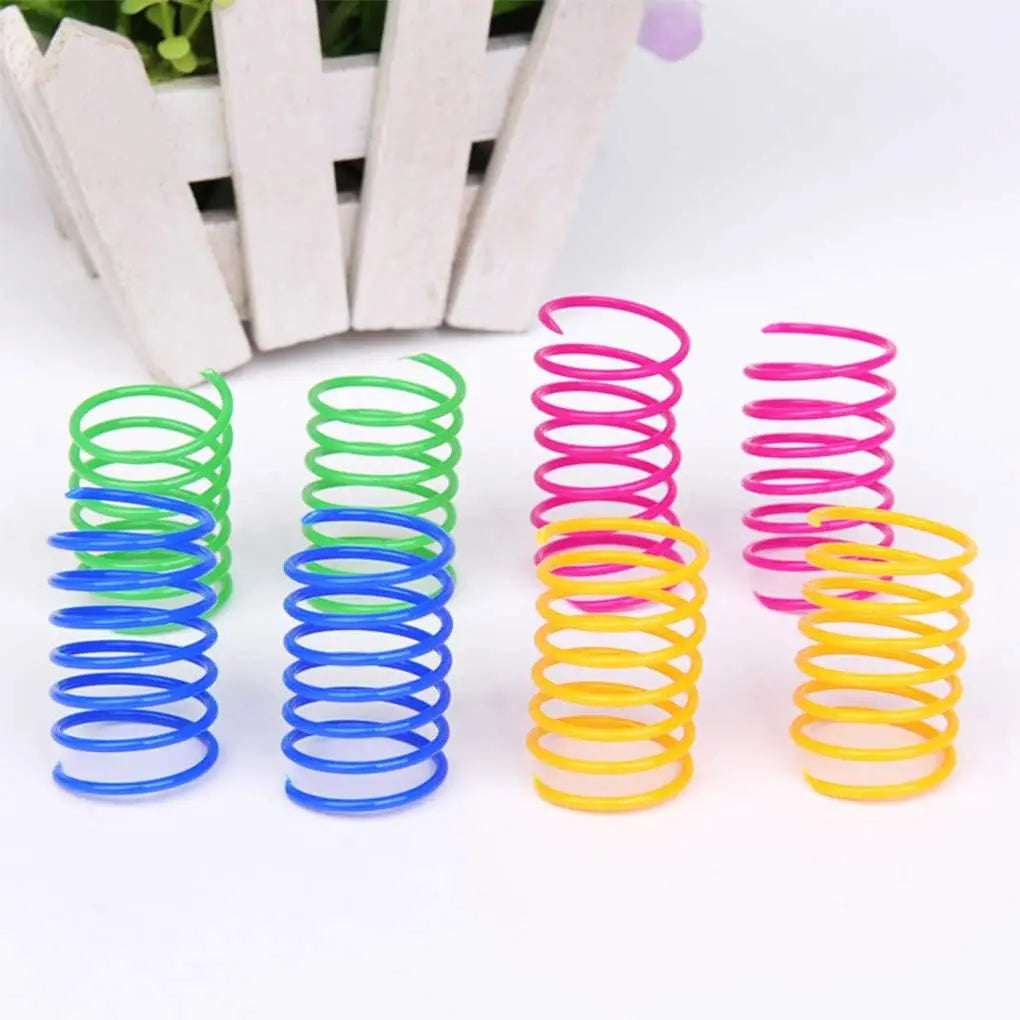 Colorful bouncy spring cat toy made of elastic plastic coil, suitable for cats and kittens, measuring 2.17 inches long.