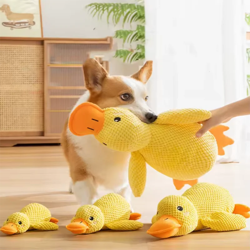 FanzyMarket plush duck dog toy with squeaker, soft and durable for puppies, helps clean teeth and calms dogs during play.