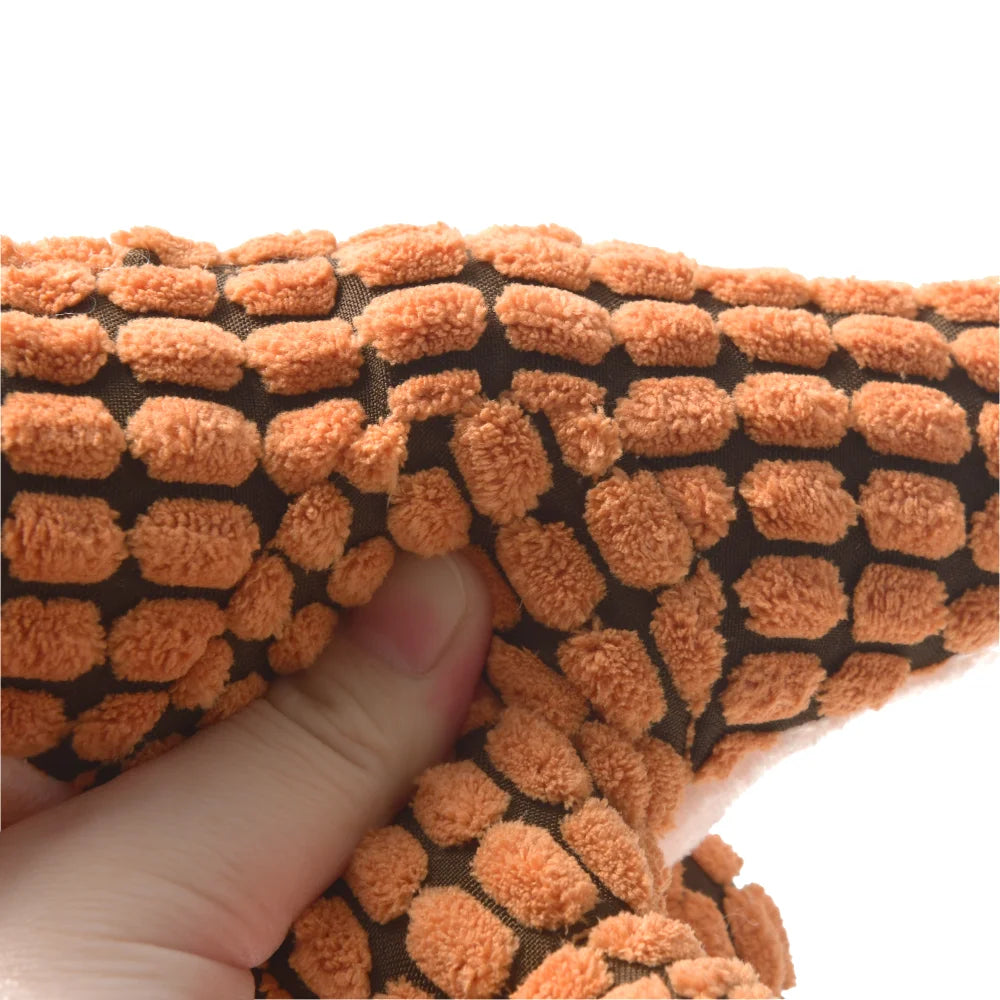 FanzyMarket plush dinosaur chew toy for dogs and cats, interactive fleece toy designed for small pets, soft and durable pet plaything.