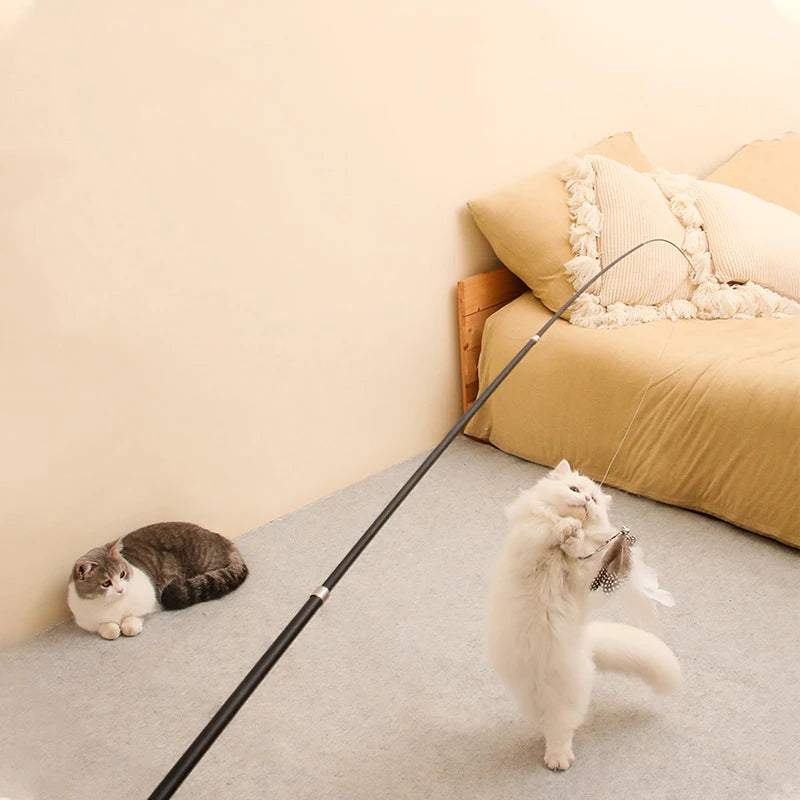 White telescopic cat wand, 1.8m extendable feather teaser toy, scratch-resistant and interactive pet toy by FanzyMarket.