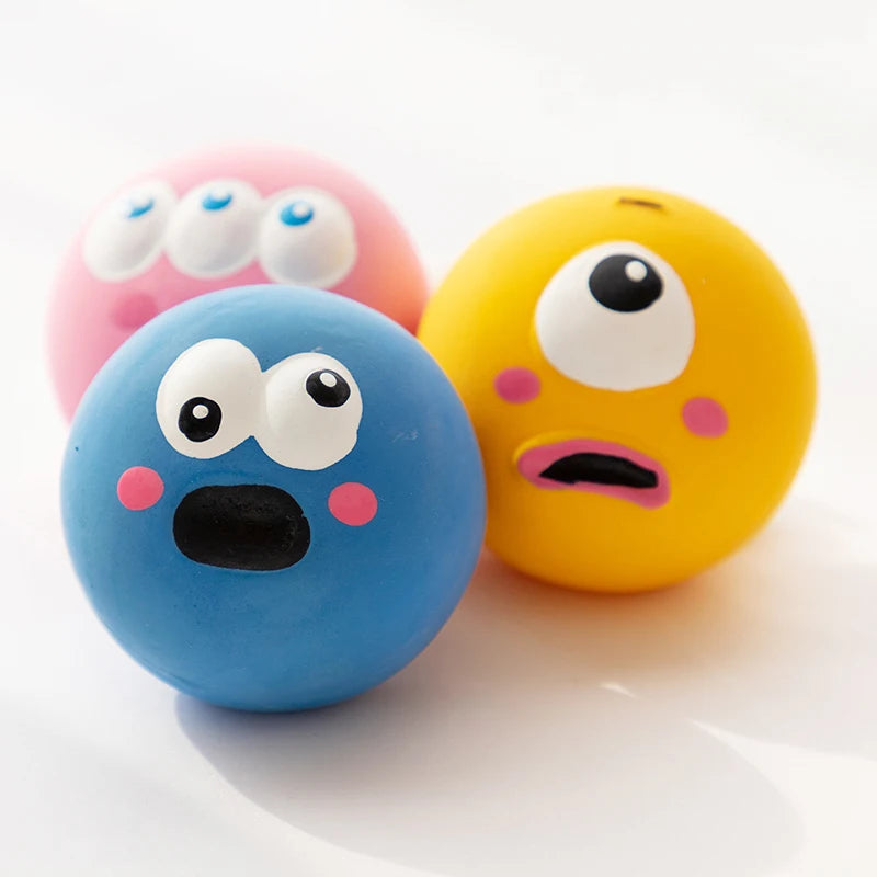Yellow dog squeaky chew ball made of bite-resistant rubber, ideal for dental cleaning and play by FanzyMarket.