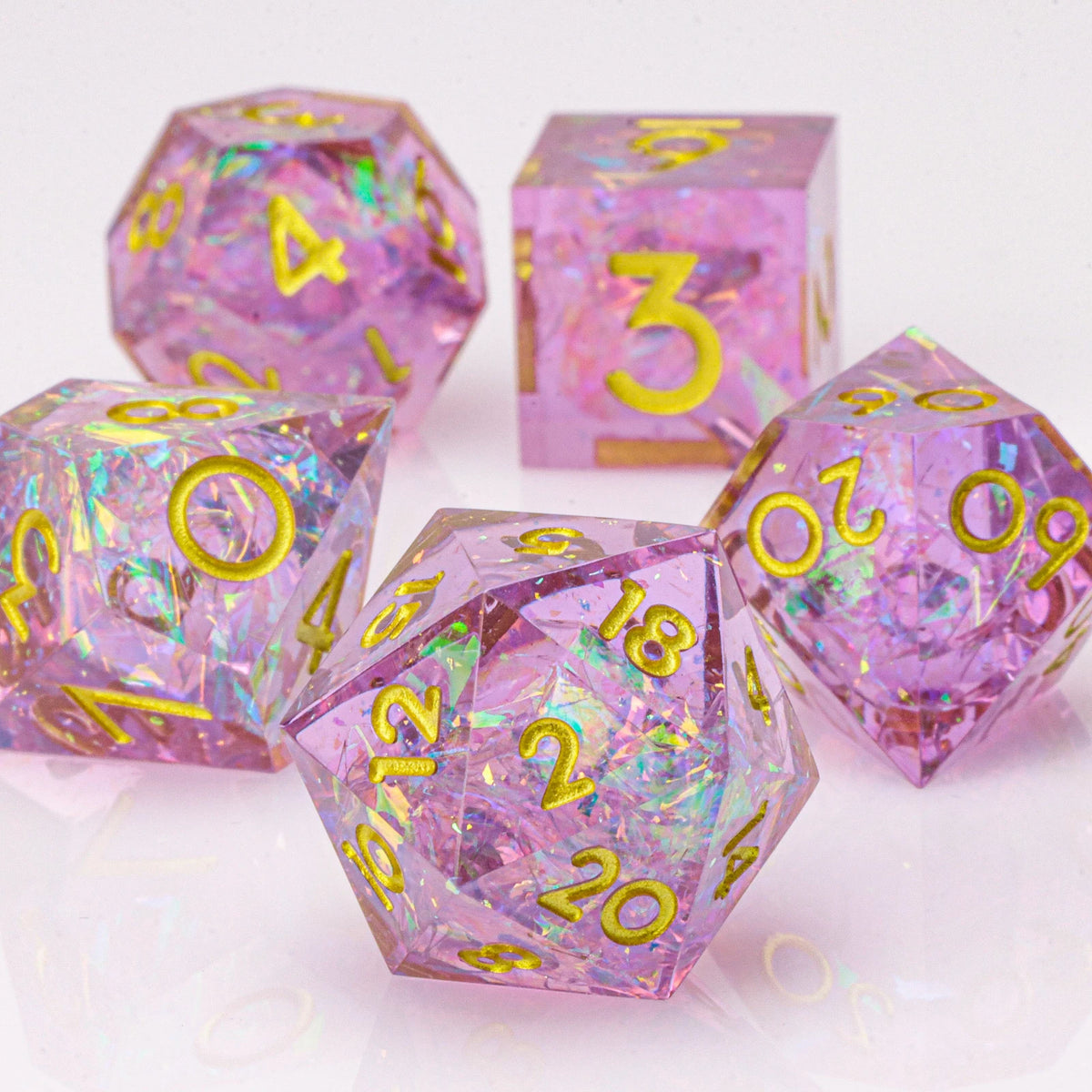 Handmade resin 7-piece D20 dice set for Dungeons & Dragons and tabletop RPGs, featuring colorful polyhedral dice by FanzyMarket