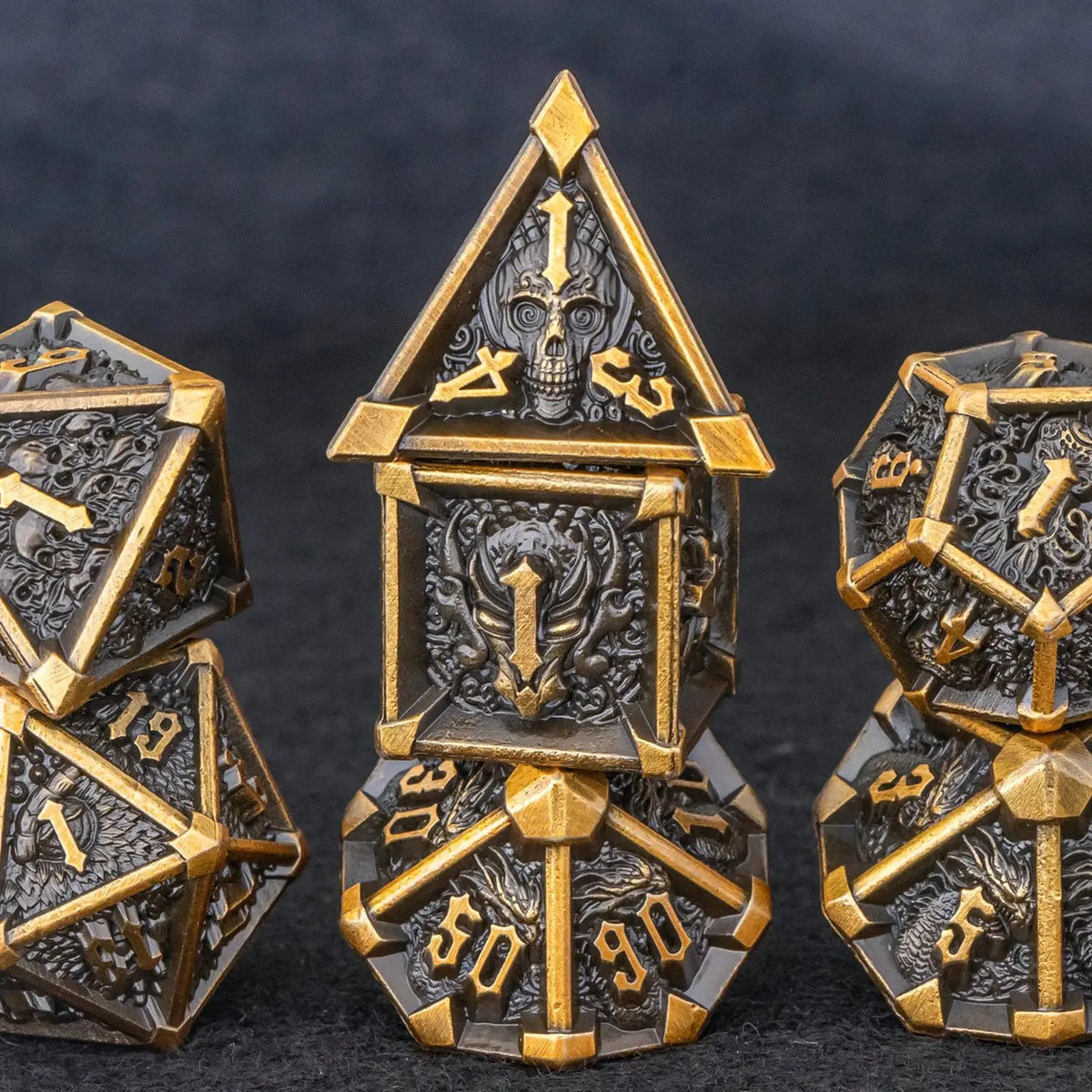 Seven-piece Skull and Dragon metal D&D dice set featuring polyhedral shapes for tabletop role-playing games.