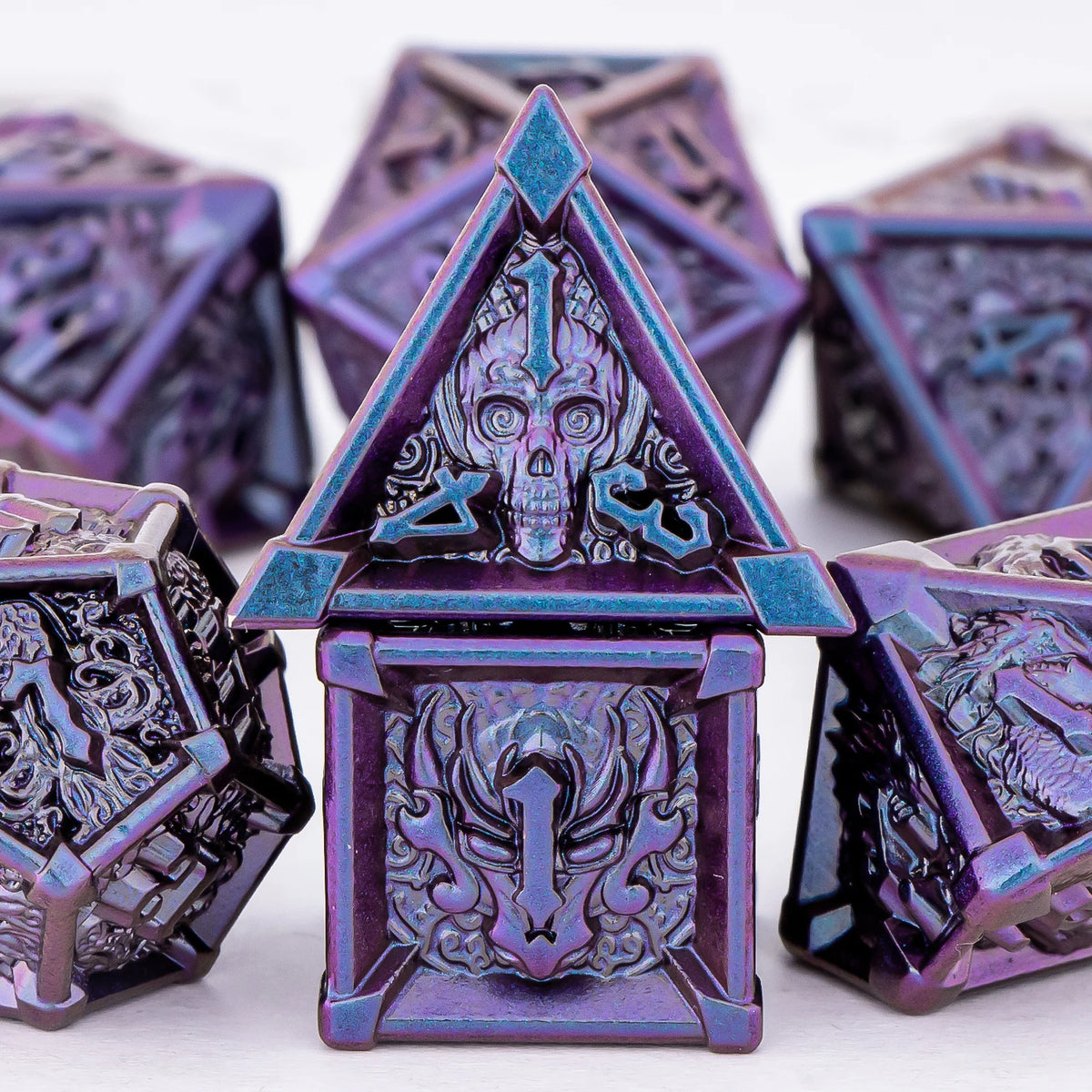 FanzyMarket skull and dragon metal dice set featuring 7 polyhedral D&D dice for tabletop RPG gaming.