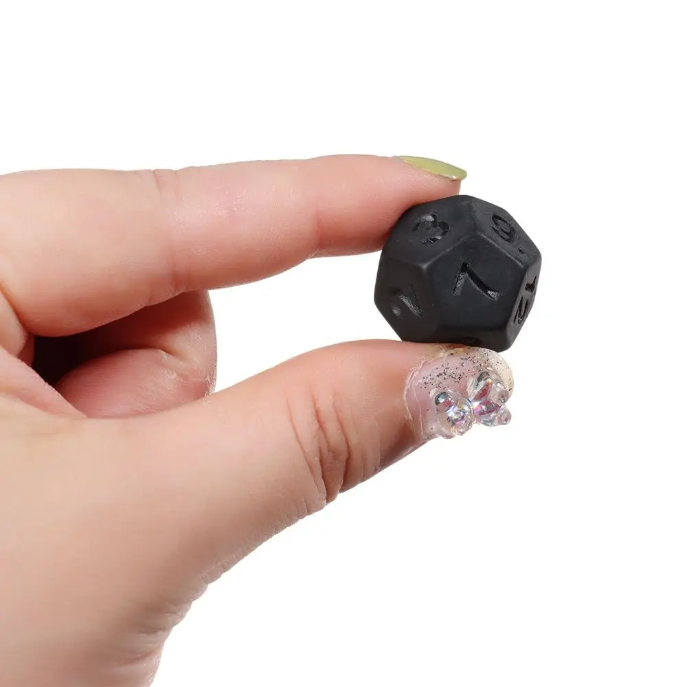 Black polyhedral dice set for D&D and tabletop RPGs, including 7 dice with numbers visible, by FanzyMarket.