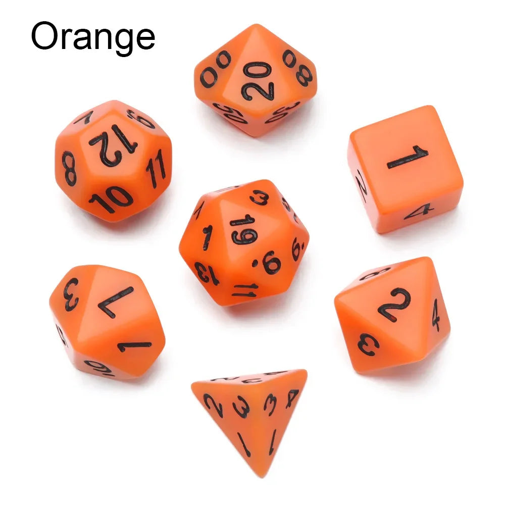 Black 7-piece polyhedral dice set from FanzyMarket for D&D, tabletop RPG, board, and card games, showing various dice shapes.