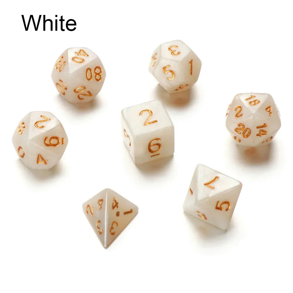 7-piece black polyhedral dice set for D&D and tabletop RPGs by FanzyMarket, showing various dice with engraved numbers.