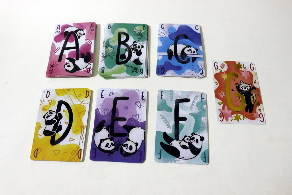 FanzyMarket panda-themed card strategy game for families, featuring colorful panda illustrations and poker-style gameplay.