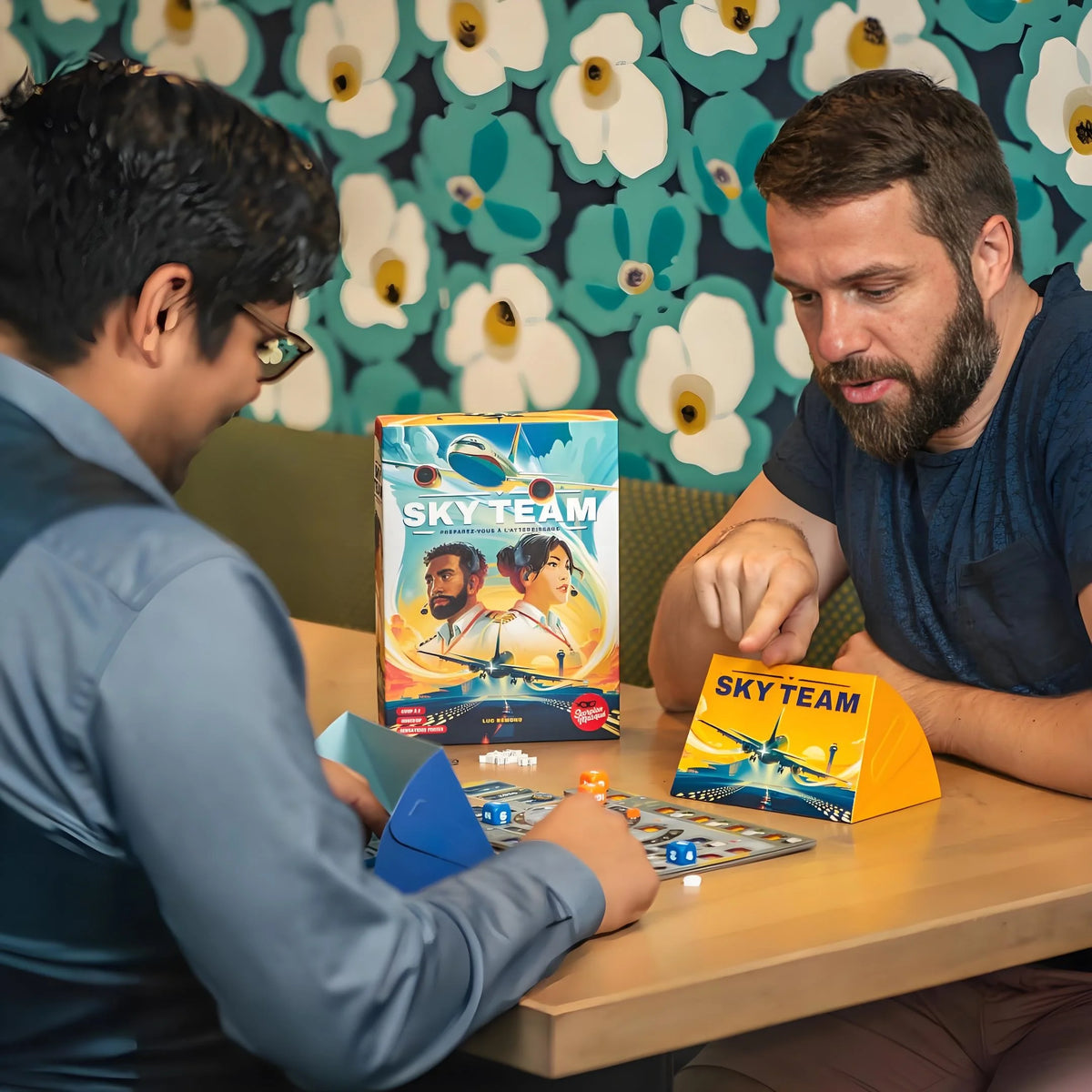 Sky Team Cooperative Board Game by FanzyMarket showing two players landing a plane in a fast-paced strategy game for teens and adults.