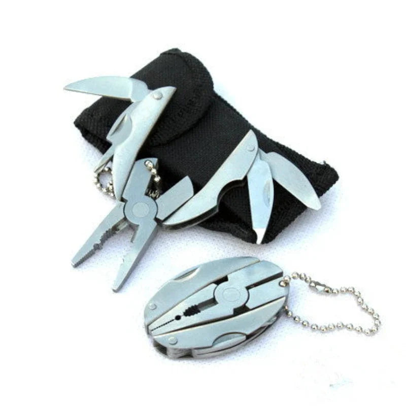 FanzyMarket compact steel multi-tool with folding pliers, knife, screwdriver, and keychain for camping and outdoor survival activities.
