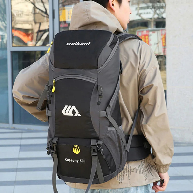 50L waterproof hiking backpack by FanzyMarket, durable outdoor rucksack for camping, travel, and climbing for men and women.