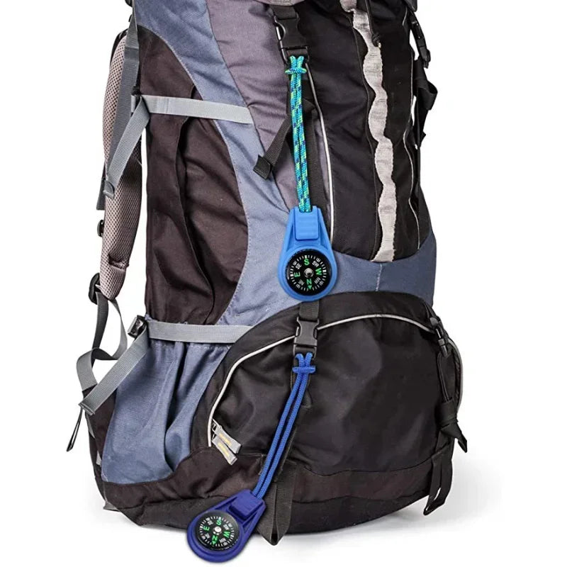 Blue mini tactical pocket compass keychain by FanzyMarket, ideal for camping, hiking, and outdoor survival activities.