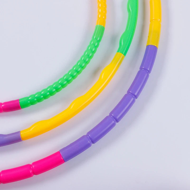 Colorful FanzyMarket adjustable kids' hula hoop, portable plastic fitness ring designed for waist training and active play.