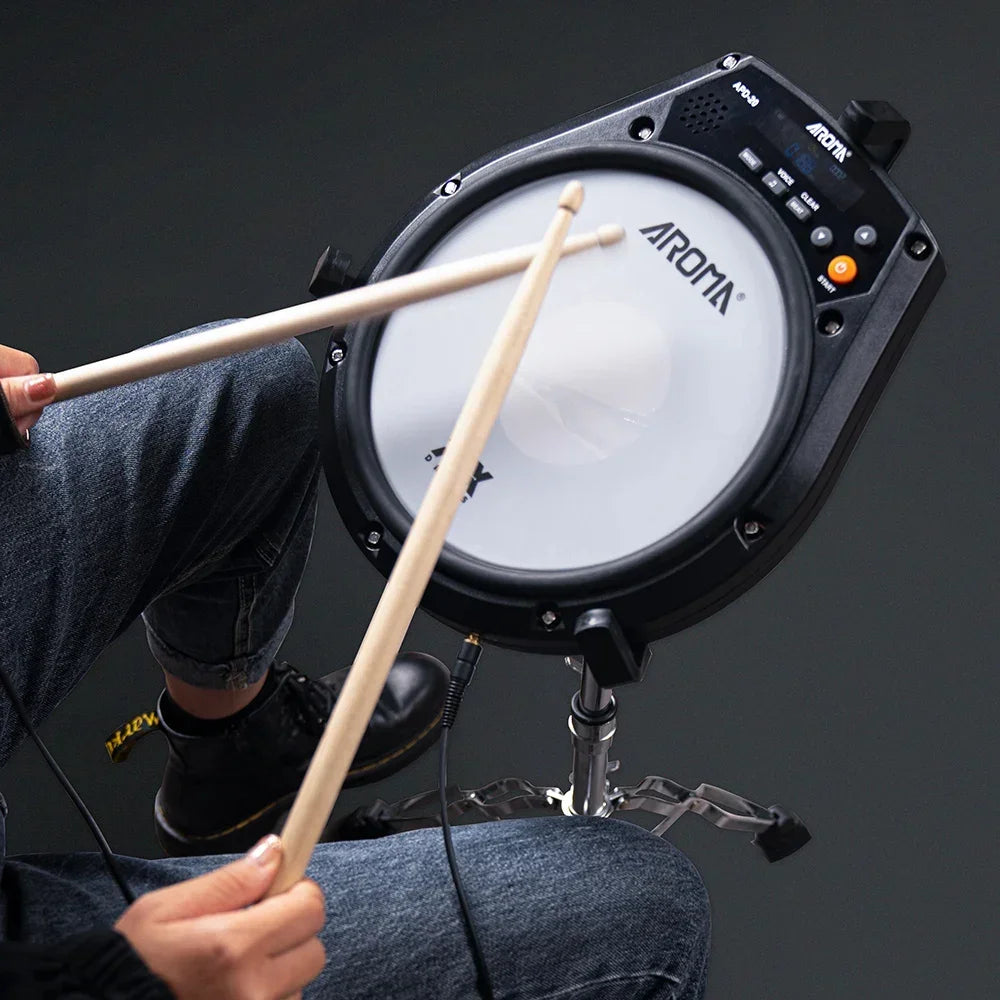FanzyMarket rechargeable electronic drum pad with 8-inch mesh surface, built-in speaker, metronome, and USB-C connection.