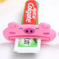 Cartoon Rolling Toothpaste Squeezer Dispenser for Kids – Tube Saver Holder (1.6 x 3.5 in / 4 x 9 cm) – 1 or 2-Pack