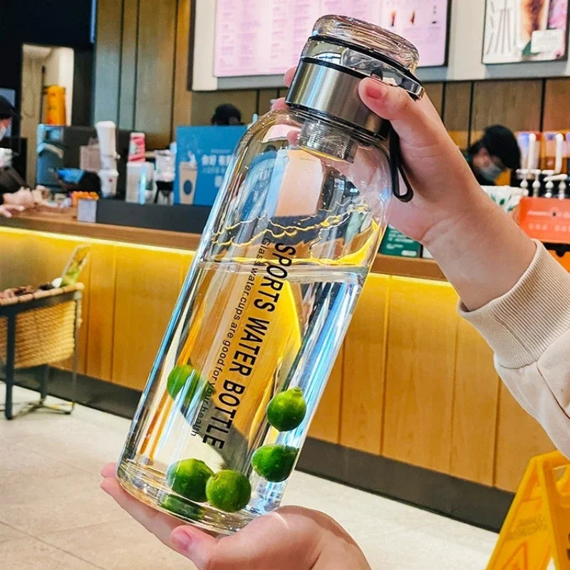2L (67.6 fl oz) Borosilicate Glass Water Bottle – Leakproof Portable Bottle with Sleeve, Handle & Tea Filter