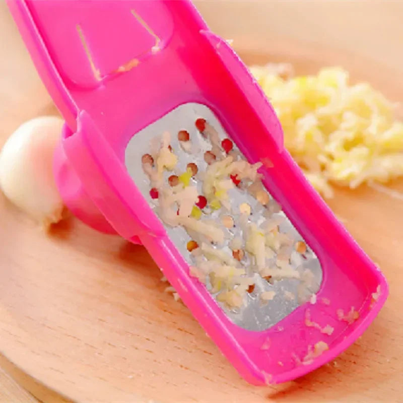 Garlic Press & Peeler — Garlic Grinder, Ginger Grater and Vegetable Slicer Kitchen Tool
