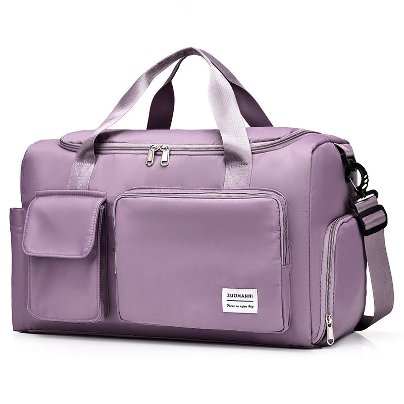 Lavender FanzyMarket carry-on weekender duffel bag with shoe compartment and wet/dry pocket for women, ideal for travel and overnight trips.