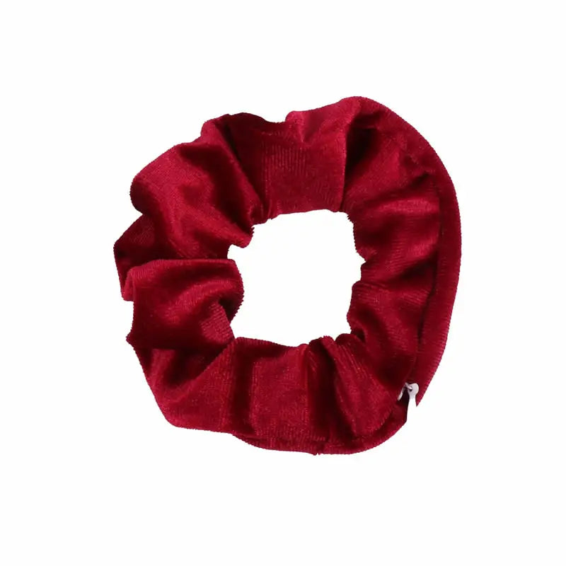 Purple FanzyMarket hidden pocket scrunchie hair tie with zipper, designed to securely hold keys, cash, or jewelry for travel and festivals.