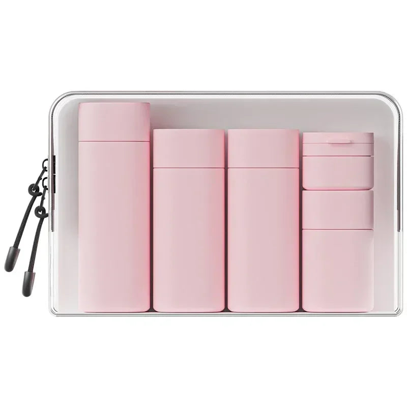 FanzyMarket 5-piece travel bottle set with soft-touch refillable toiletry dispensers in assorted colors, sizes 15ml to 100ml.