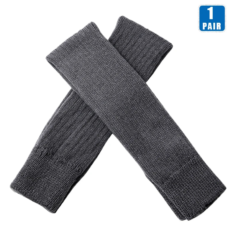 Black women's over-the-knee knit leg warmers from FanzyMarket, open-heel footless thigh-high socks, soft winter gaiters in 27 and 36 inches.