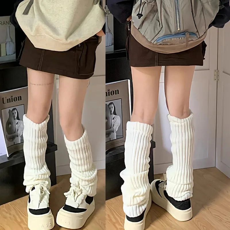 Pair of black and white women’s Y2K knit leg warmers with crochet boot cuffs, 50cm length, styled as fashionable accessories.