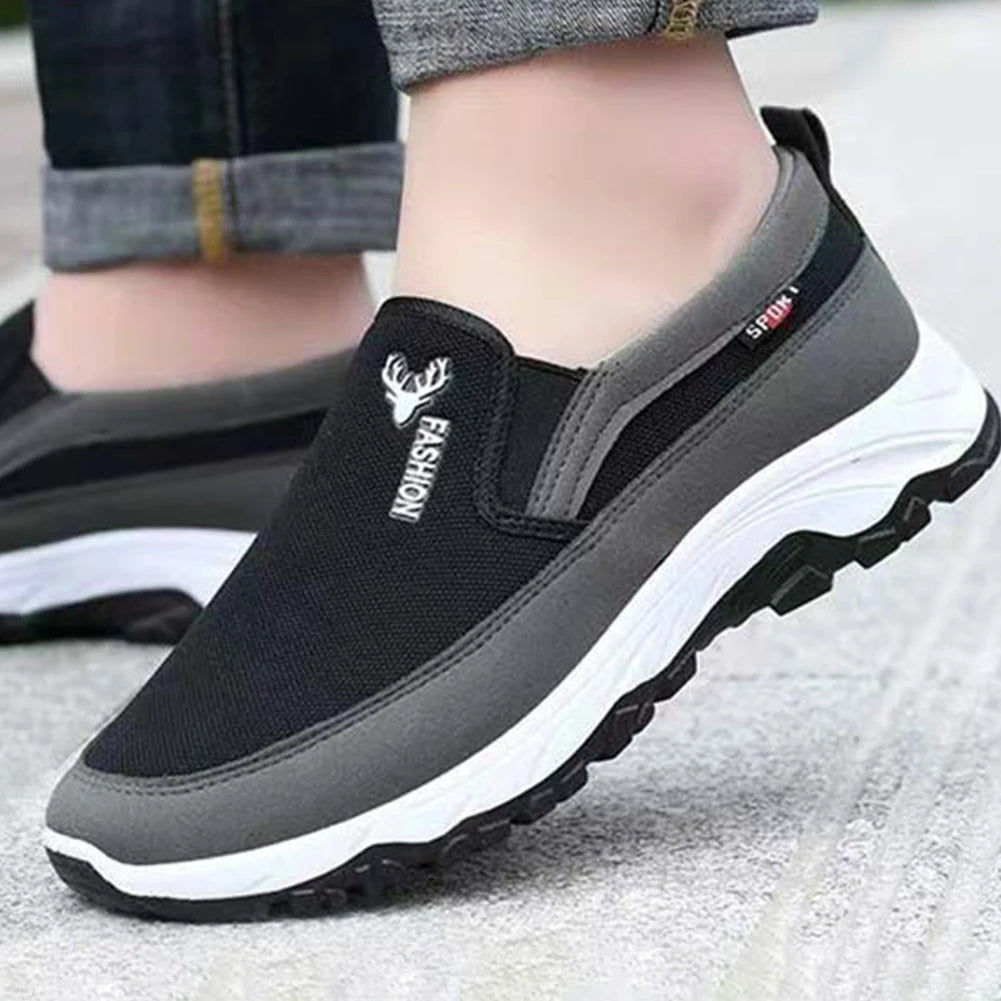 Blue men's orthopedic slip-on travel shoes by FanzyMarket, breathable, non-slip sneakers ideal for walking and hiking.