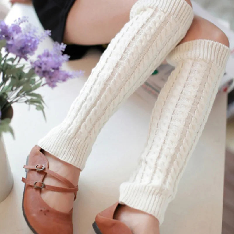 Women's knit leg warmers and crochet boot cuffs in black and white, 40 cm long, ideal for autumn and winter fashion.