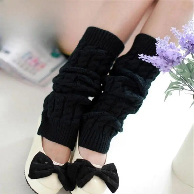 Women's knit leg warmers by FanzyMarket, 40 cm long crochet boot cuffs in black and white, perfect for autumn winter fashion.