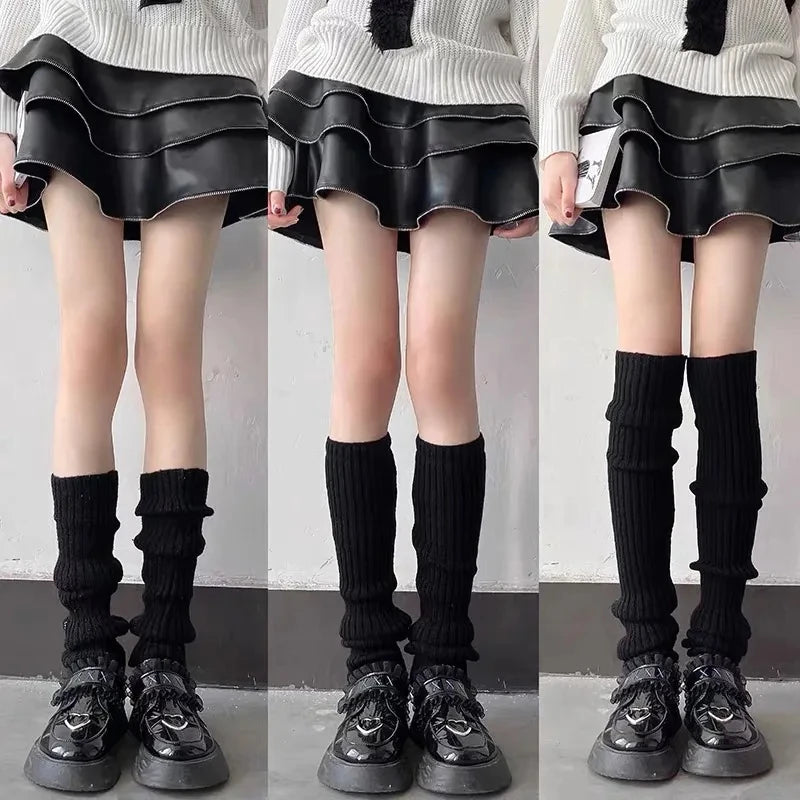 Pair of FanzyMarket knit bubble leg warmers in black, Y2K punk gothic crochet style, available in 40, 50, and 70 cm lengths.