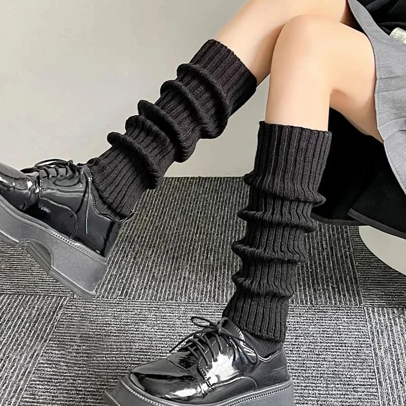 Pair of FanzyMarket knit bubble leg warmers in black, Y2K punk goth style, 40, 50, or 70 cm crochet boot cuffs for legs.