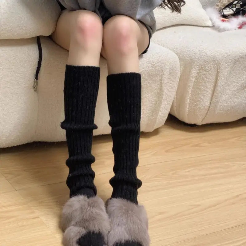 Pair of FanzyMarket knit bubble leg warmers in black, Y2K punk gothic crochet design, available in 40, 50, and 70 cm lengths.
