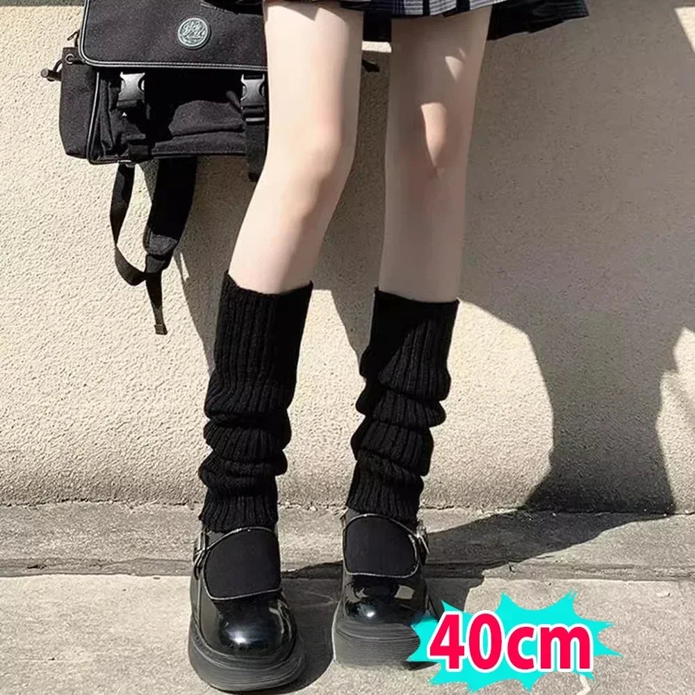 Y2K fluffy knit leg warmers for women by FanzyMarket, black and white Gothic Lolita arm and boot covers in various lengths.
