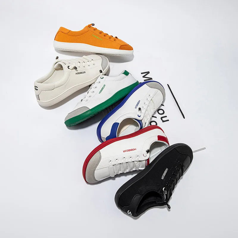 FanzyMarket wide toe barefoot minimalist sneakers in white and green, unisex lightweight slip-on walking shoes.