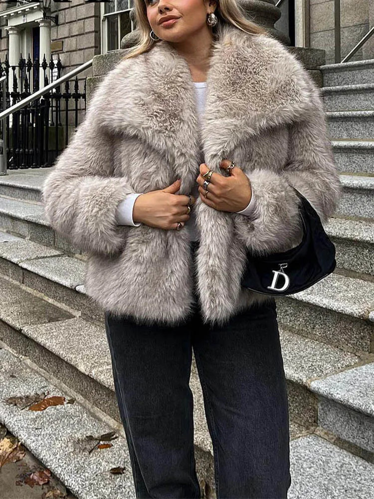 White cropped faux fur jacket for women by FanzyMarket with long sleeves, snap buttons, lapel collar, perfect for winter warmth.