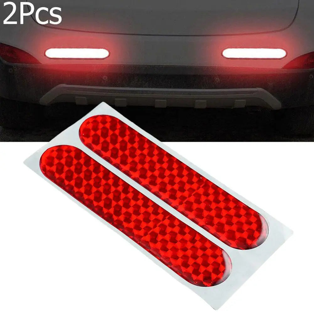 Two red reflective car door safety stickers by FanzyMarket, interior warning reflector tape, 10.6 x 2.3 cm for auto and moto safety.