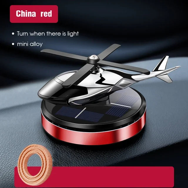 FanzyMarket solar helicopter propeller car air freshener and aromatherapy diffuser, decorative accessory for vehicle interior.
