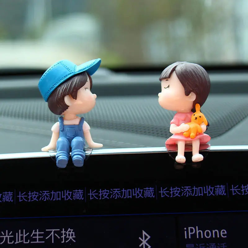 Cute cartoon couple car dashboard figurines by FanzyMarket with romantic balloon ornament for car interior decor.