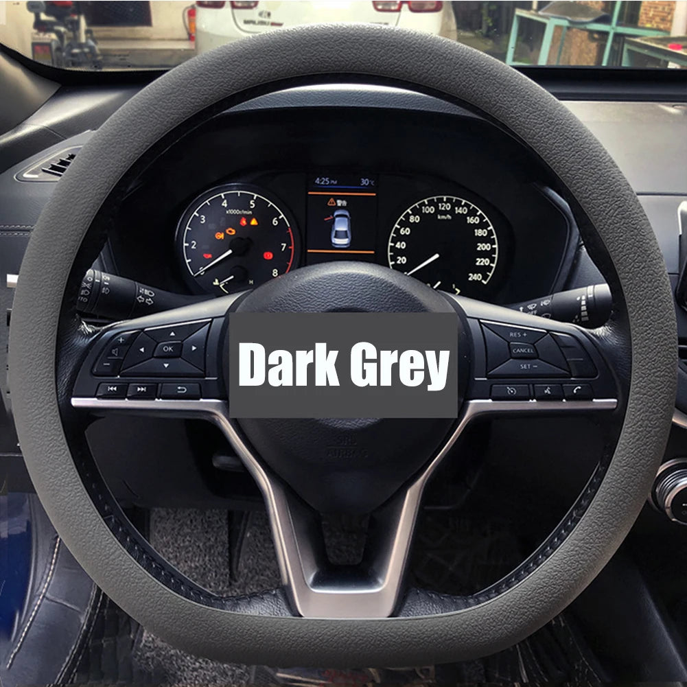 FanzyMarket purple silicone steering wheel cover with elastic, non-slip grip for 36-40 cm (14-16 in) car wheels.