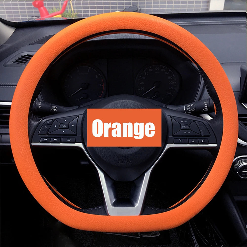 FanzyMarket universal silicone steering wheel cover with elastic, non-slip grip in multi-color, fits 36-40 cm (14-16 in) car wheels.