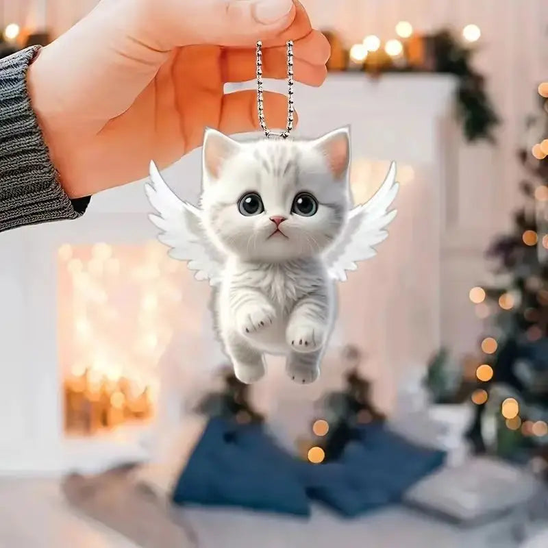 Cute cat-shaped rearview mirror ornament hanging inside a car, adds playful decor to the vehicle interior.