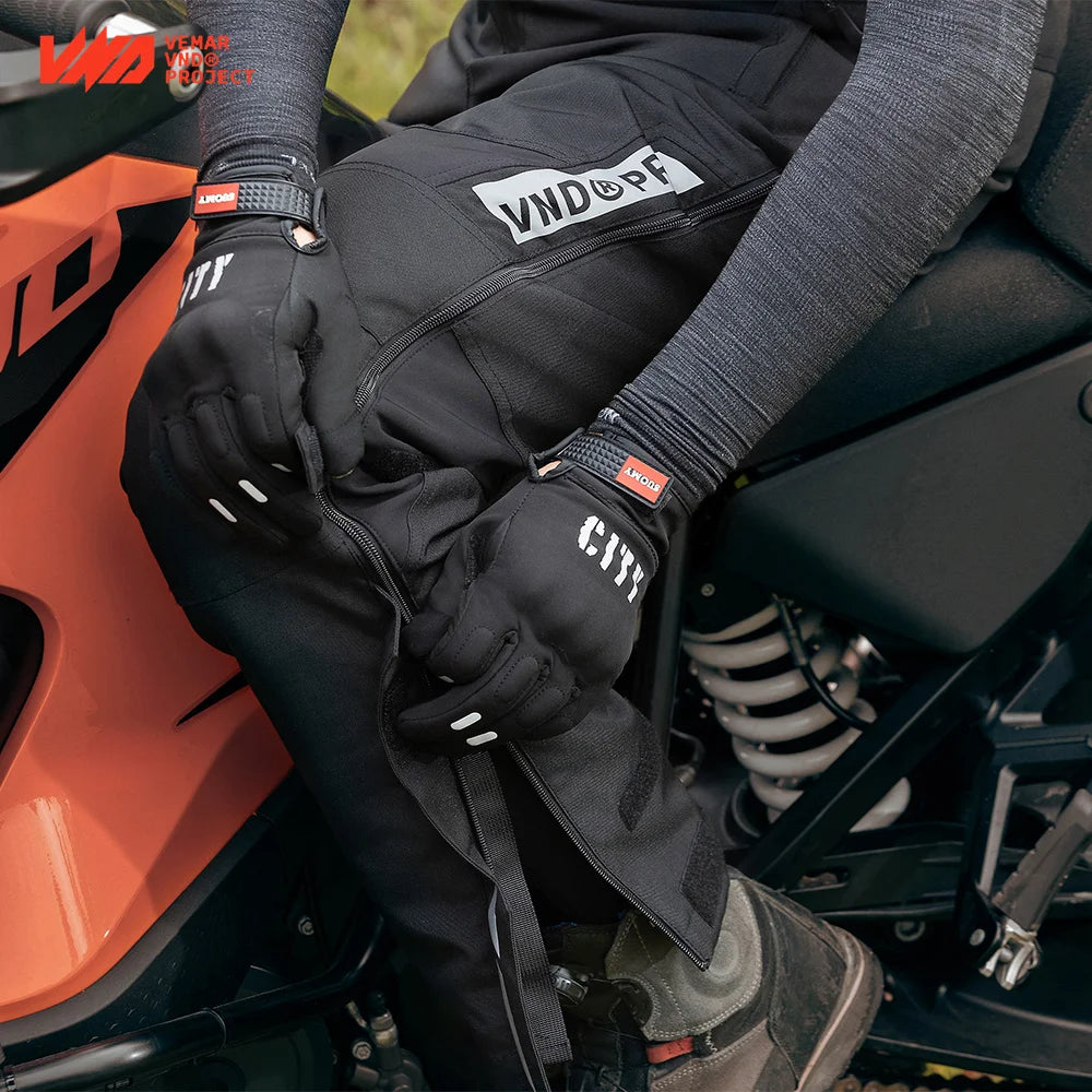 Black men's winter waterproof motorcycle overpants with CE knee pads, quick-release design, insulated windproof touring trousers.