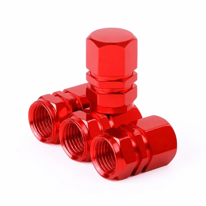 Red aluminum alloy tire valve stem caps for car, motorcycle, and bicycle, dustproof and corrosion-resistant, 1.6 x 1.0 cm.