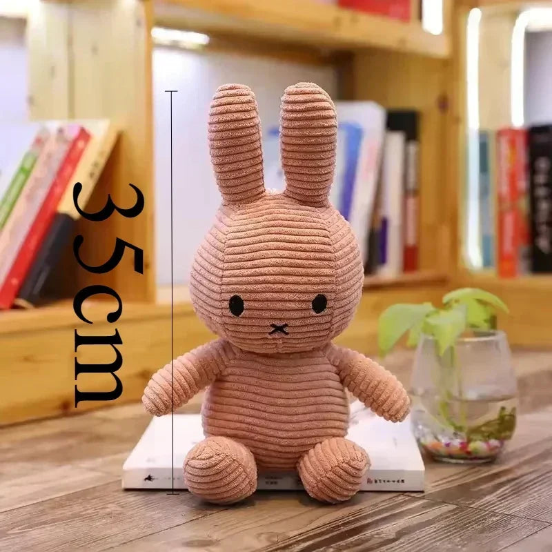 FanzyMarket green cotton plush bunny doll, 25cm, soft sleeping cuddly toy for babies and kids, perfect Easter gift and nursery decor.