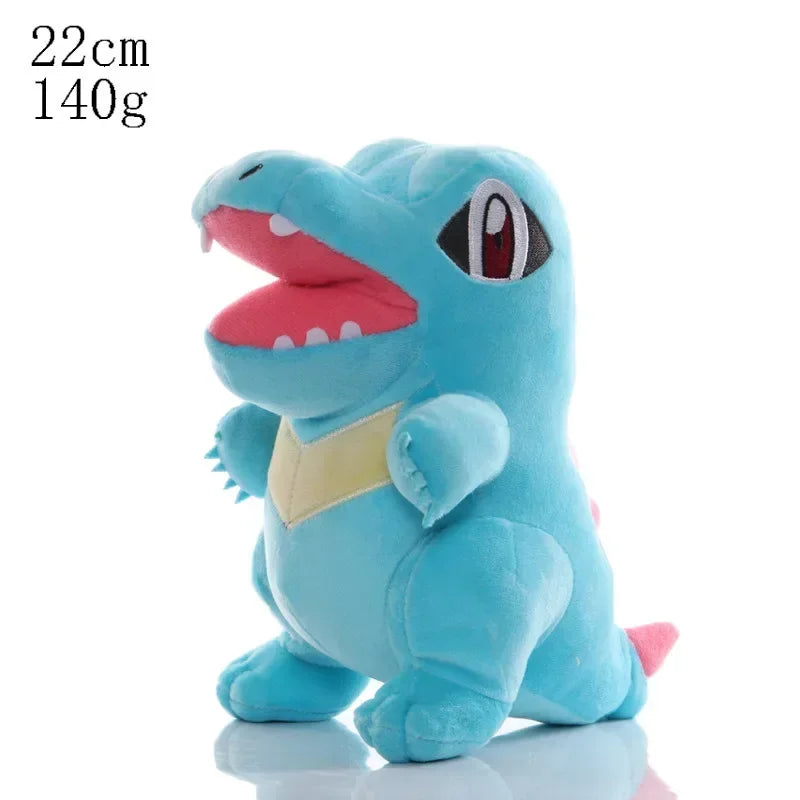 FanzyMarket plush baby stuffed toys featuring Pikachu, Charmander, Bulbasaur, Squirtle, Psyduck, and Eevee in vibrant colors.
