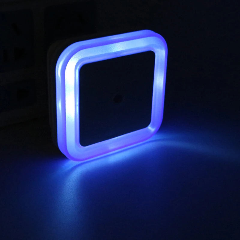 FanzyMarket LED sensor night light with EU plug, blue glow, auto on/off, 360° illumination suitable for bedroom and nursery.