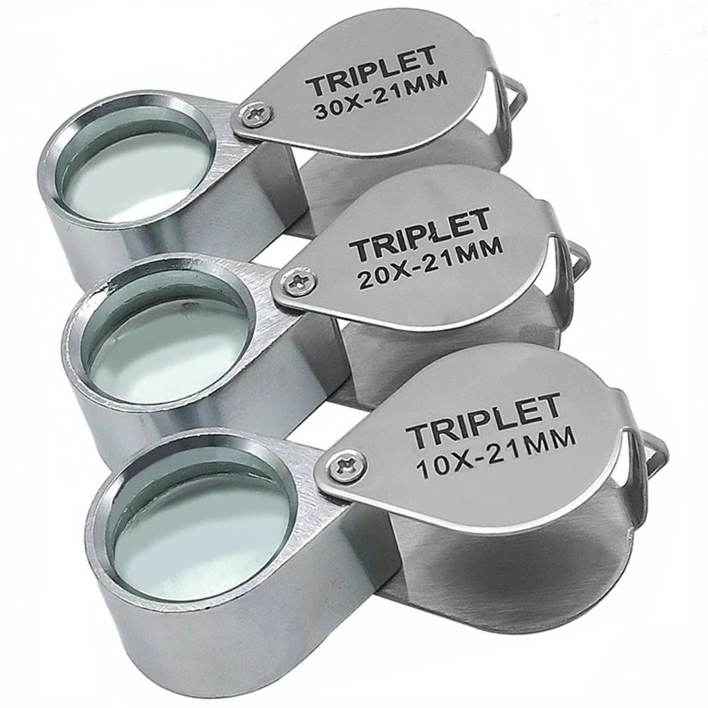 Pocket folding jewelry loupe magnifier with triplet glass lens for 10x, 20x, and 30x magnification.