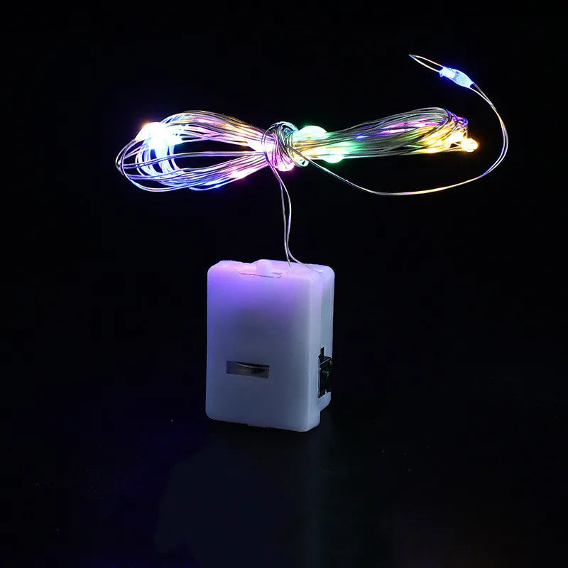 FanzyMarket button battery LED fairy string lights in pink, 2m length, 20 warm white, white, blue, pink, or multicolor LEDs for indoor outdoor use.