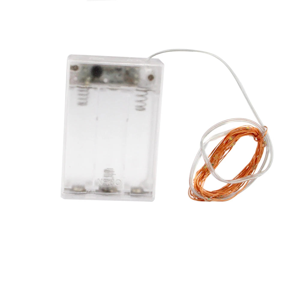 FanzyMarket battery-operated 2m copper wire fairy string lights with 20 LEDs, white color, timer function, ideal for wedding and holiday decor.
